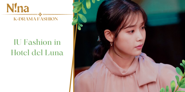 Image for a review from a pictures taken from Hotel del Luna where the protagonist is looking on her side, absorved in her thoughts and with a pink bluse with a big bow